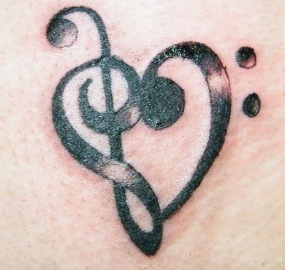 music note tattoo designs. Music Notes Heart Tattoo